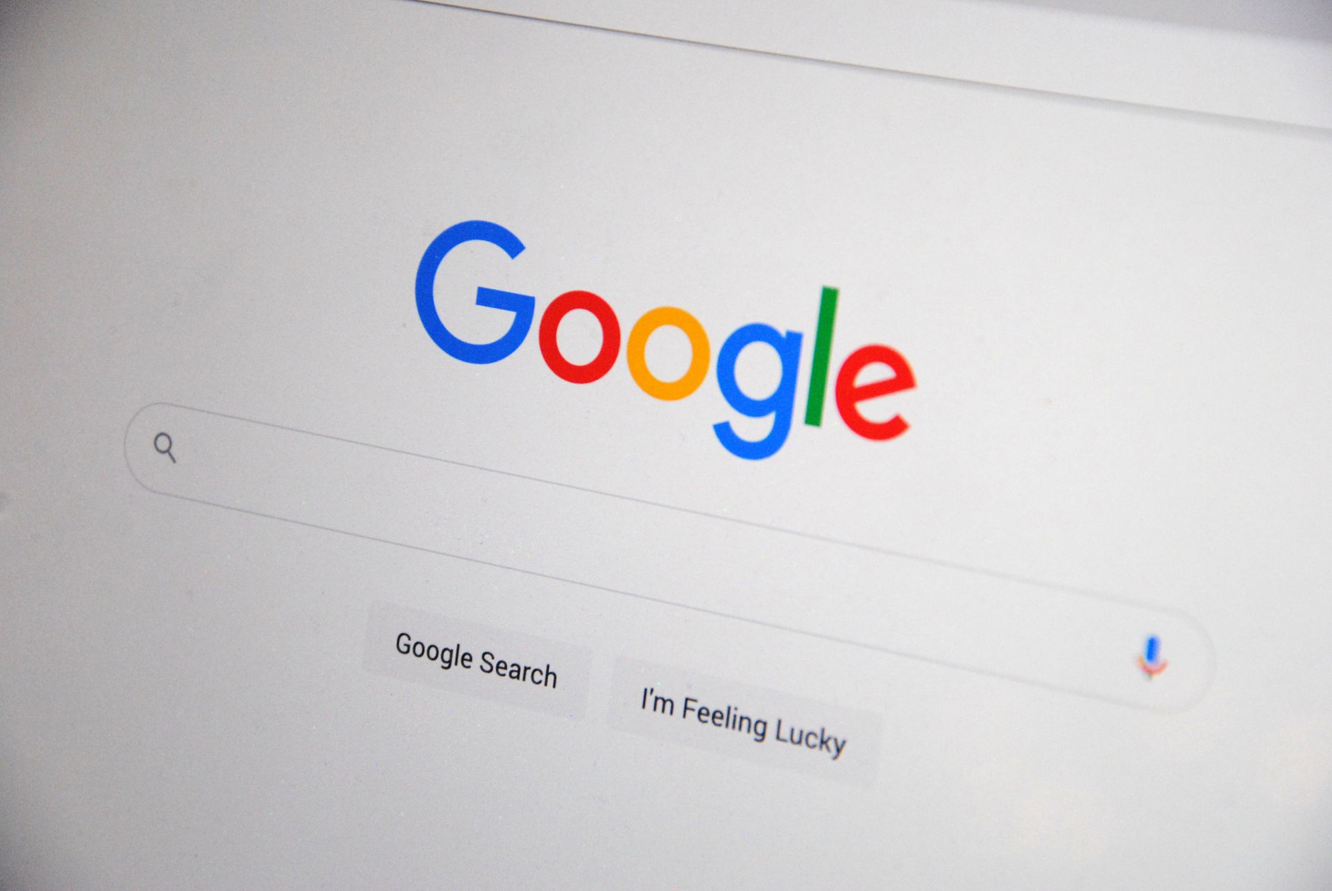 Close-up of the Google logo and search bar on a computer screen